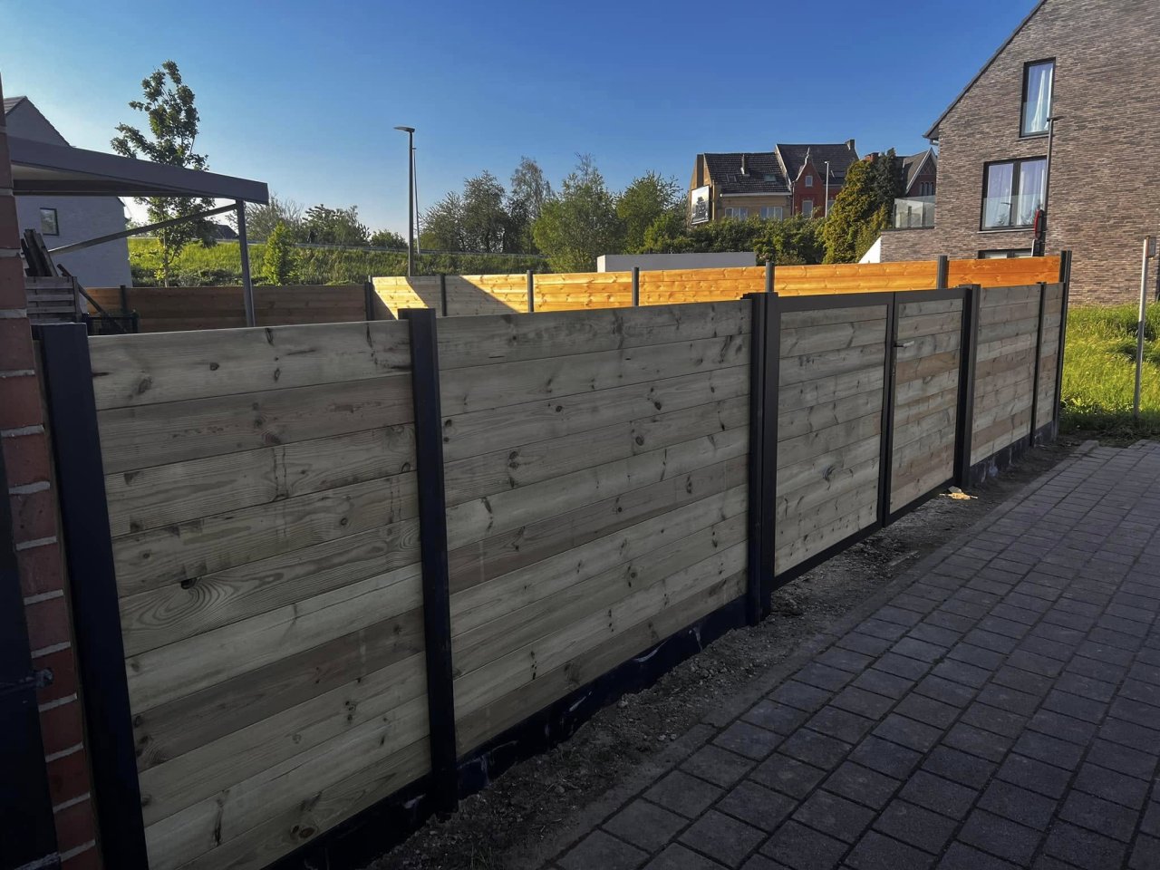 Tuinen Claessens plaatst afsluitingen in hout, steen, haag ... in Aalst en omstreken.